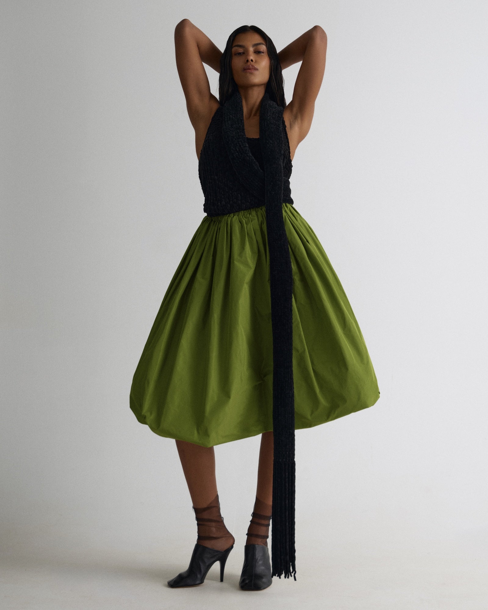 Спідниця міді