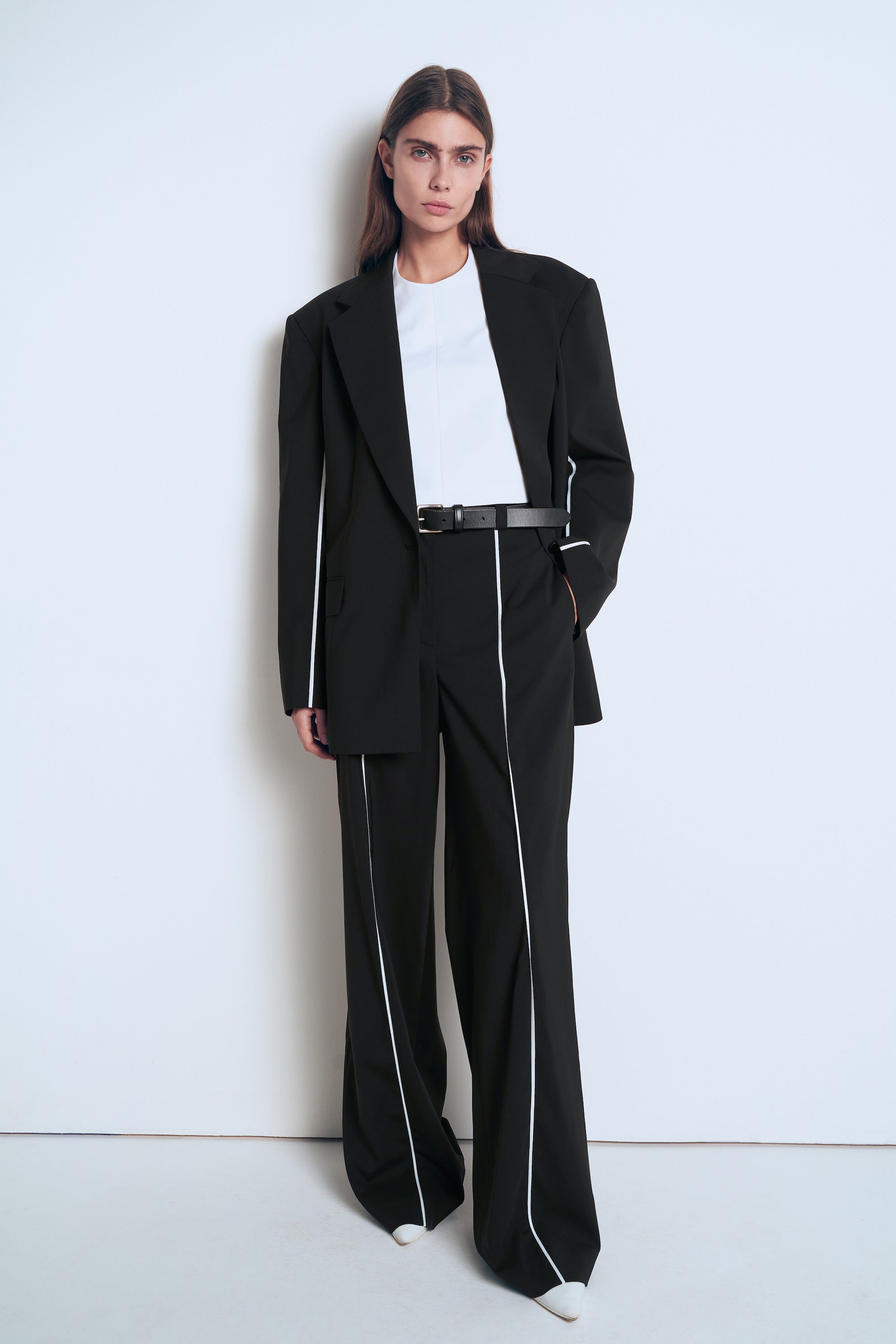 Trousers with white piping