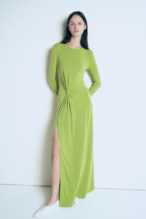 Green knitted dress with a knot